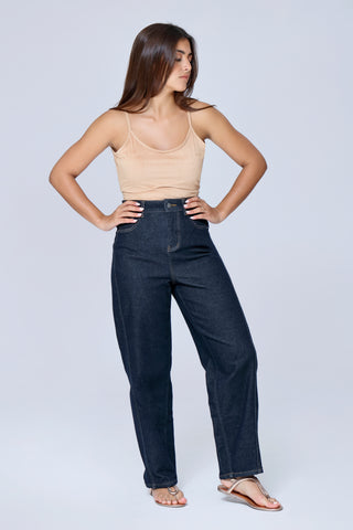 Model wearing Funky Soul High-Rise Barrel Leg Jeans in premium indigo denim, full front view.