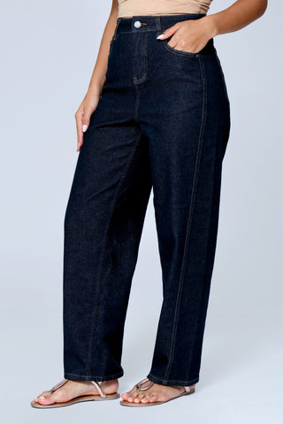 Model wearing Funky Soul High-Rise Barrel Leg Jeans in premium indigo denim, full front view.